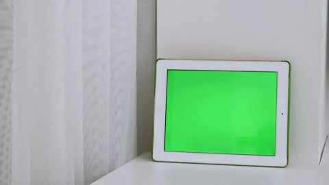 White horizontal tablet with green screen in white interior. Chroma key. Mockup Stock Footage 219792006