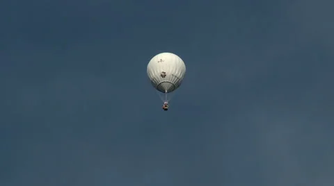White hot air balloon floating in sky Stock Footage 58403229