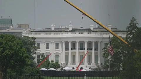 The White House with a crane in front, seen from the Ellipse Stock Footage 345278573