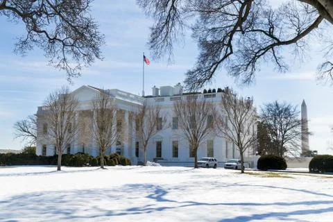 White house front yard corner view in winter Stock Photos