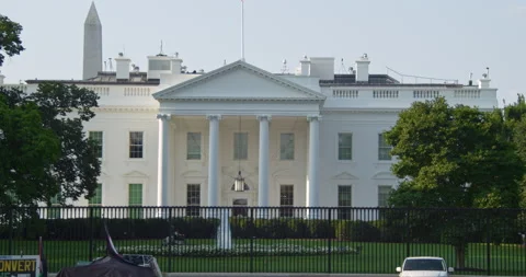 The White House in Washington D.C., gardner cutting grass on White house lawn Stock Footage 138707990