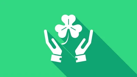 White Human hands holding four leaf clover icon isolated on green background Stock Footage 146951931
