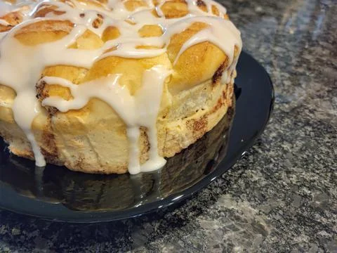 White Icing on Cinnamon Rolls Stock Photos