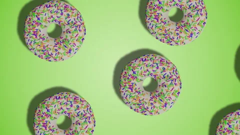 White icing donuts simple diagonal motion design pattern on green bg Stock Footage 196481686
