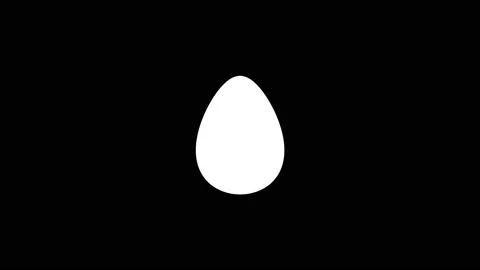 White icon of egg appears on a black background. Stock Footage 216795265