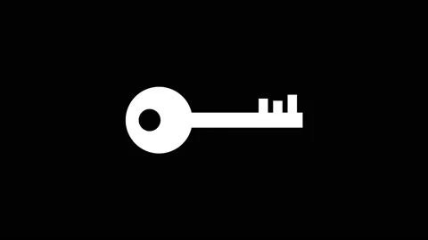 White icon of key appears on a black background. Stock Footage 219742223