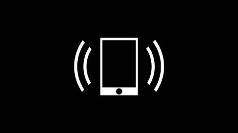 White icon of notification on the phone appears on a black background. Stock Footage 212908378