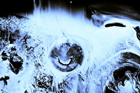 White Ink And Paint Liquid Reaction / Cosmos Nebula background NASA Hubble Stock Footage 107501371