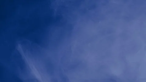 White ink and particles slowly floating like Stock Footage 100533310