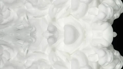 White ink billowing in close-up through black water Stock Footage 338271250