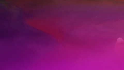 White ink diffusing in colored water Stock Footage 100020197