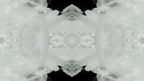 White ink expands into a soft mirrored mass on black Stock Footage 338110420