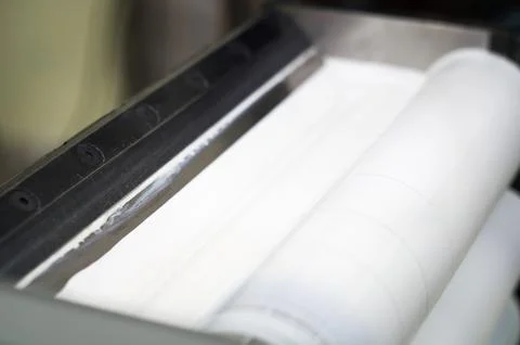 White ink in the paint system compartment of a modern flexographic printing Stock Photos
