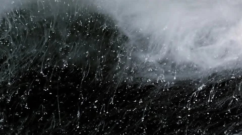 White ink particles floating trough space, slow motion, black background Stock-Footage 52676042