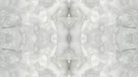 White ink swirling in close-up through black water, creating occult forms Stock Footage 338271247