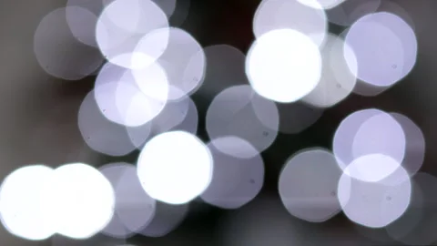 White Intermittent defocused lights, sparkling flickering bokeh lights. Stock Footage 260321687