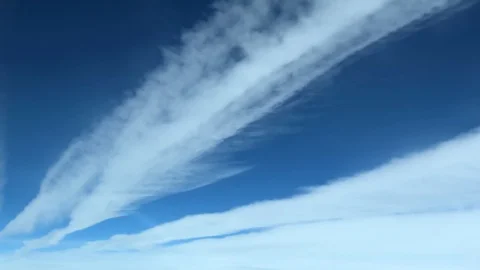 White inversion trace airplane on a clear blue sky. Stock Footage 100627770