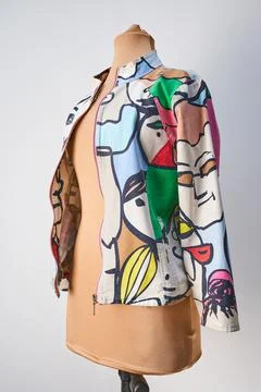 White jacket with zipper and multicolor print. Multicolor spring dress Stock Photos