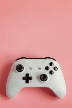 White joystick on pink background. Computer gaming competition videogame cont Stock Photos