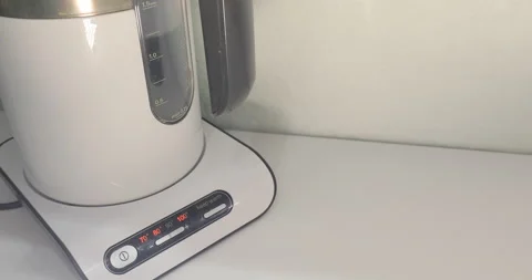 White kettle boils 스톡 동영상 145365198