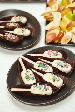 White key pops, decorated with multi colored beads Stock Photos