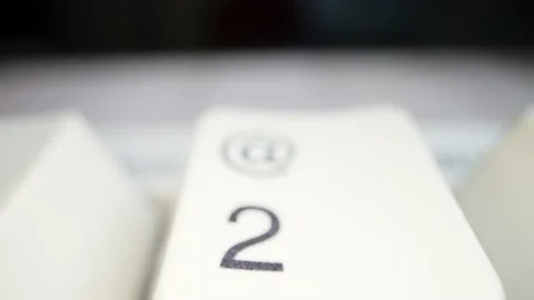 White keyboard keys. Camera movement from left to right. Macro photography. Stock Footage 146106888