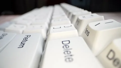 White keyboard keys. Camera movement from left to right. Macro photography. Stock Footage 146106953