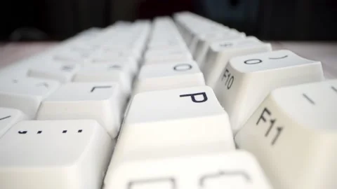 White keyboard keys. Camera movement from left to right. Macro photography. Stock Footage 146107039