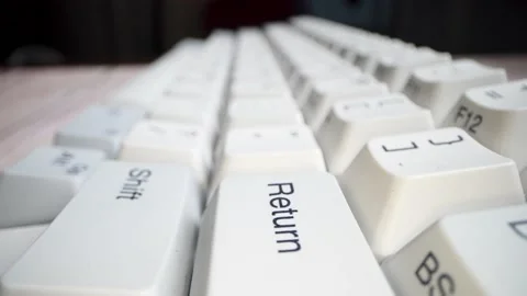 White keyboard keys. Camera movement from left to right. Macro photography. Stock Footage 146107061
