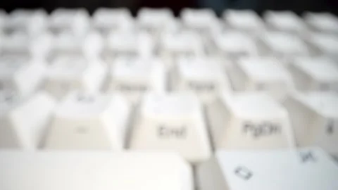 White keyboard keys. Camera movement from left to right. Macro photography. Stock Footage 146107157