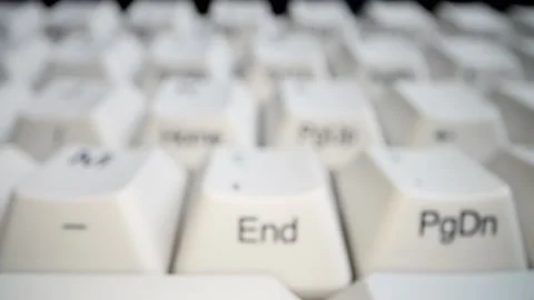 White keyboard keys. Camera movement from left to right. Macro photography. Stock Footage 146107174