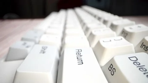 White keyboard keys. Camera movement from left to right. Macro photography. Stock Footage 146107192