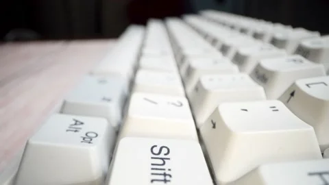 White keyboard keys. Camera movement from left to right. Macro photography. Stock Footage 146107218