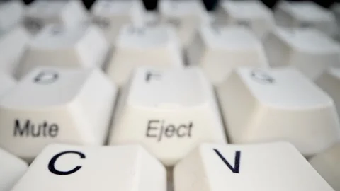 White keyboard keys. Camera movement from left to right. Macro photography. Stock Footage 146107241