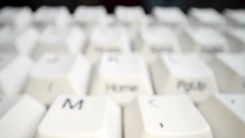 White keyboard keys. Camera movement from left to right. Macro photography. Stock Footage 146107341