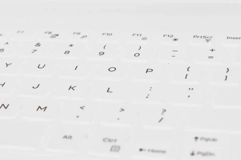White keyboard layout with pop up white light and gray button name. Stock Illustration