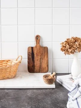 White kitchen background with brown kitchen utensils Stock Photos