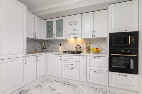 White kitchen in classic style, front view Foto stock