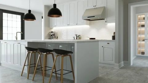 White kitchen interior with island, kitchen appliances and lighting. Video stock 253192596