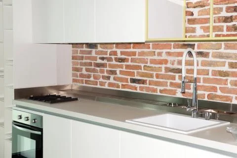 White kitchen interior in loft style close-up Stock Photos