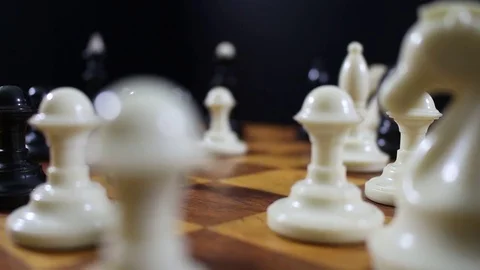 White knight on a chessboard Stock Footage 77279305