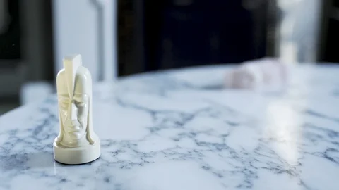 White Knite chess piece on table Stock Footage 91154917