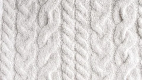 White knitted cable pattern texture for textile and fashion design Stock Photos