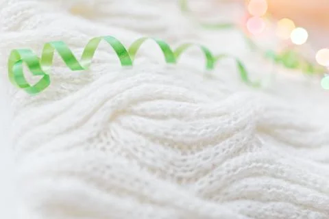 White knitted with a pattern textured background. Stock Photos