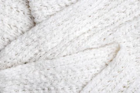 White knitted texture and background, close up. Stock Photos