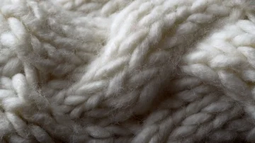 White knitted wool background extreme close up stock footage Stock Footage 85467269
