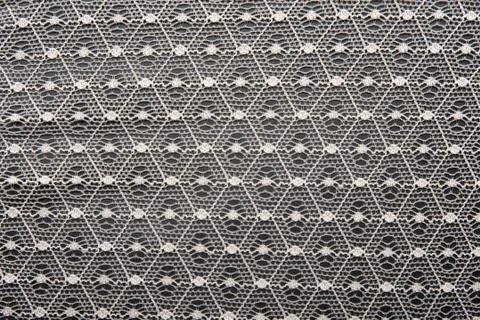 White lace on black background Stock Photos