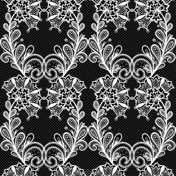 White lace seamless pattern on black background. Stock Illustration