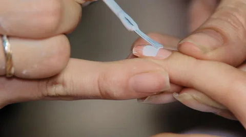 White lacquer coated nails Stock Footage 64570169