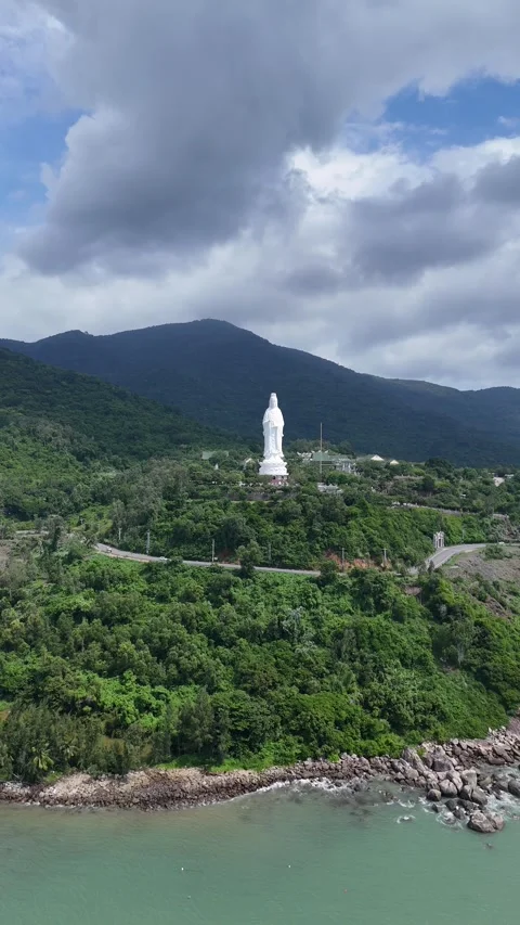 White Lady Buddha Statue Overlooking Da Nang, Vietnam Coastline Stock Footage 335834625